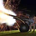 105mm gun firing in Auckland city at dawn