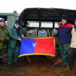 Four NZ veterans of the battle of Long Tan in Vietnam, one of them (in the blue/red jacket) a former SAS trooper. All were also attached to the US 173rd Airborne Bde, hence the banner. Our "hot box" cooked lunch in the boxes behind them.