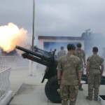 15 Gun Salute. Old gunners firing, with current gunners loading and in command. The same WW2 25 pounder guns that I fired salutes with 40 years ago at this location.